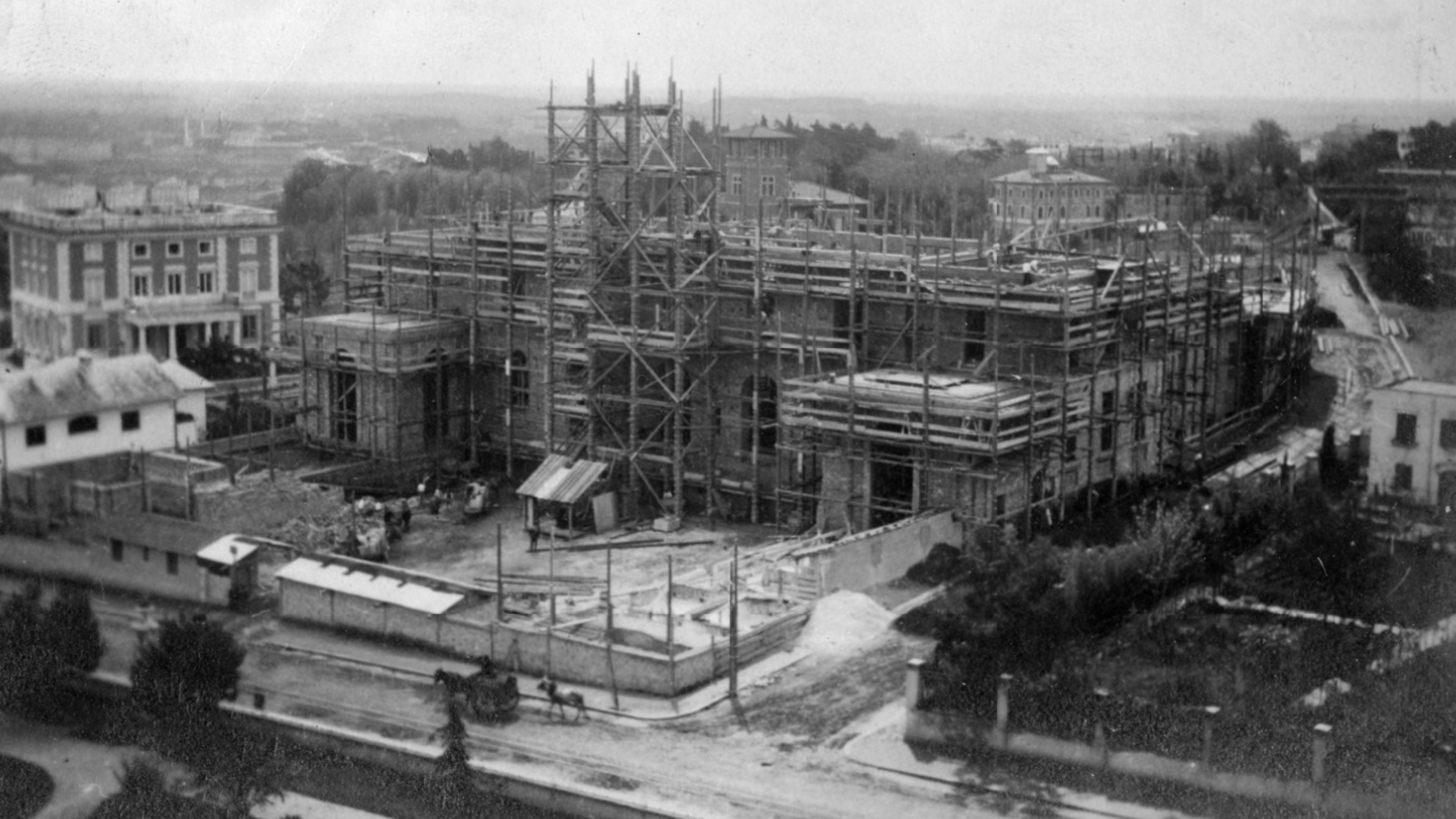 Black and white photograph of a bird's eye view of the McKim, Mead & White Building with scaffolding