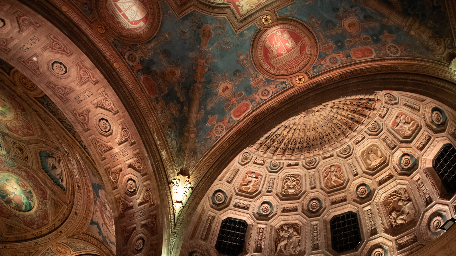 Color photograph of the ceiling of the restaurant Cipriani 25 Broadway showing the decorated vaulted ceilings