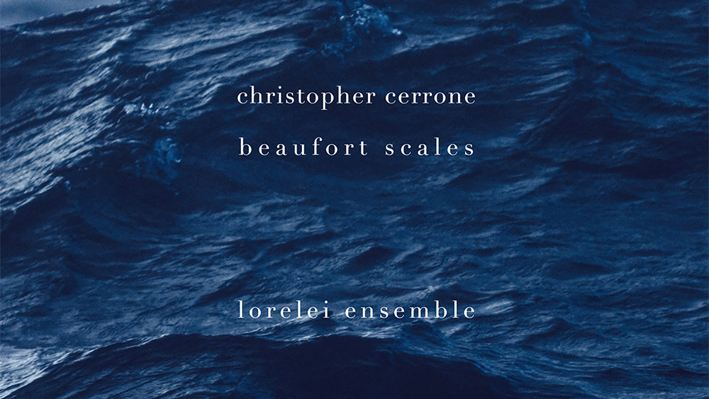 Detail of an album cover with white letters overlaid on a photo of the deep blue ocean