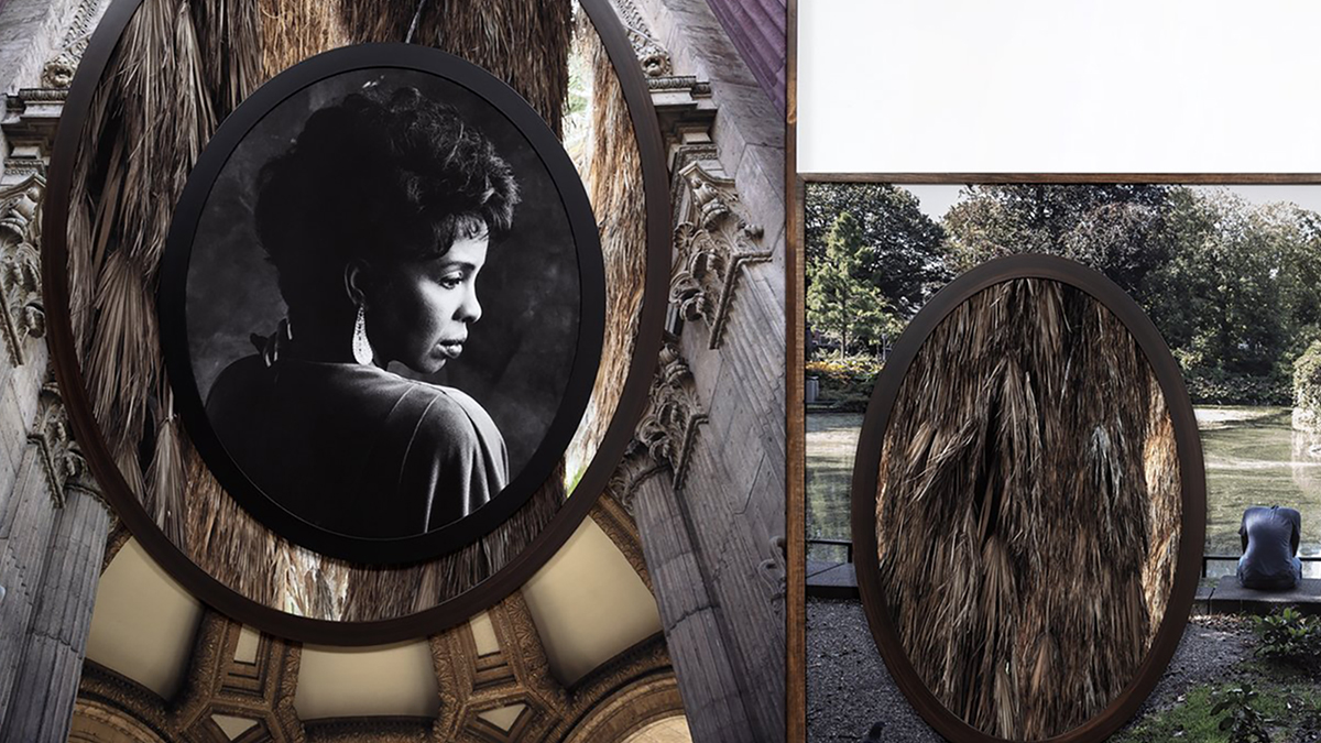 Photography and picture frames are assembled on top of and beside each other to create a fairly flat sculpture. A tall wooden rectangular frame is affixed to the left of a square wooden frame. Inside the rectangular frame is an oval-shaped photograph of a dried palm with a Black woman in profile superimposed on another oval-shaped photograph, which sits on top of a photograph looking up at an ornate castle. Inside the square frame, another oval-shaped photograph of the bark of a palm tree is layered on top