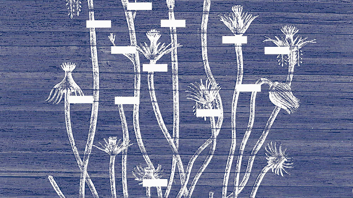 Detail of a blue and white print featuring botanical forms such as stems and flowers