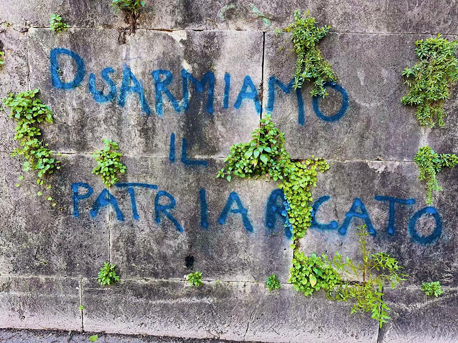 photo of grafitti on a stone wall