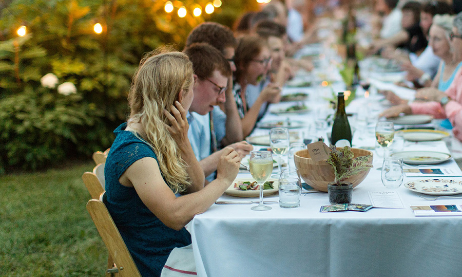 Photo of people dining outdoors