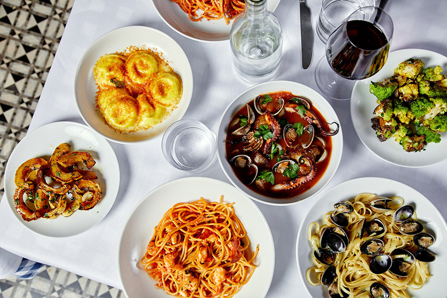 Color photograph of food on plates on a table