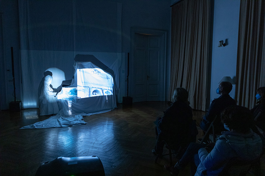 person playing piano in front of an audience