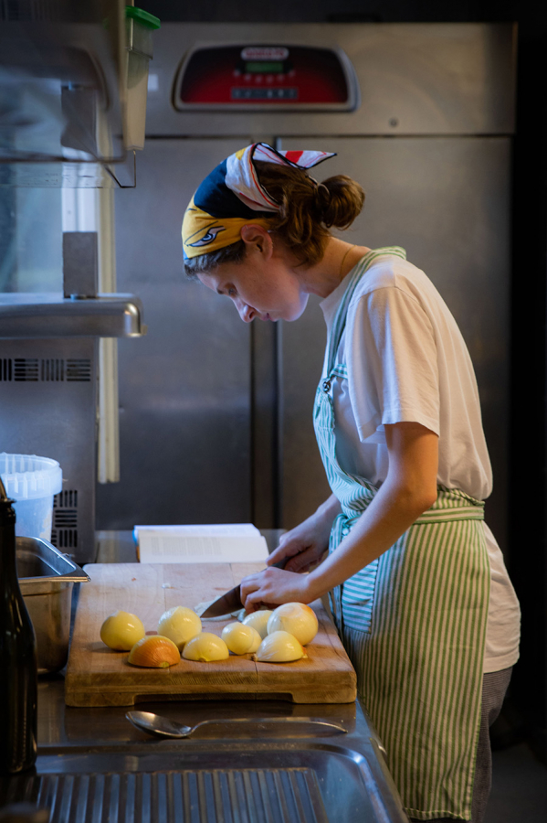 woman preparing food in a kitchen