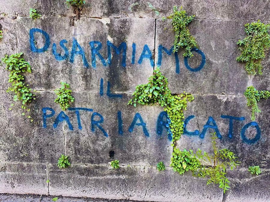 photo of grafitti on a stone wall