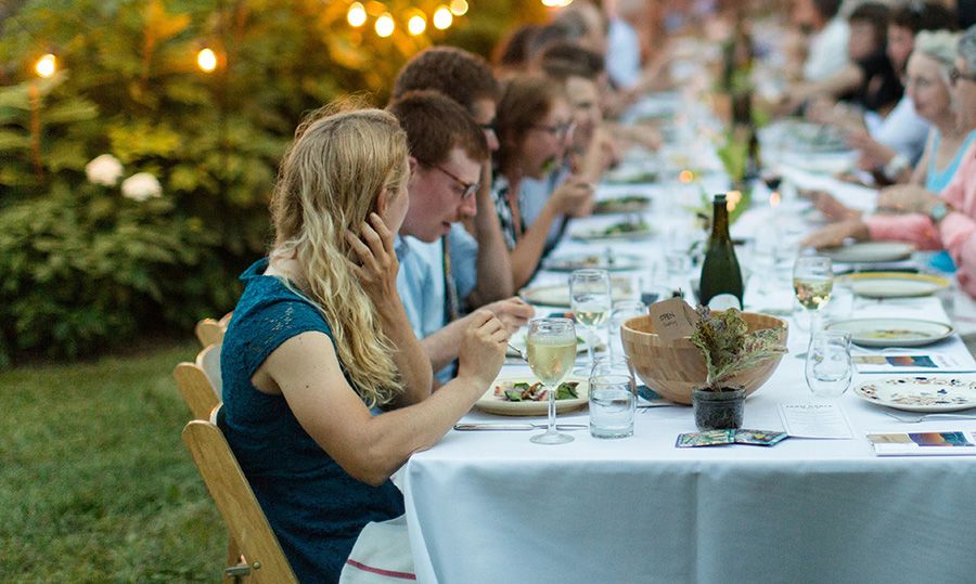 Photo of people dining outdoors