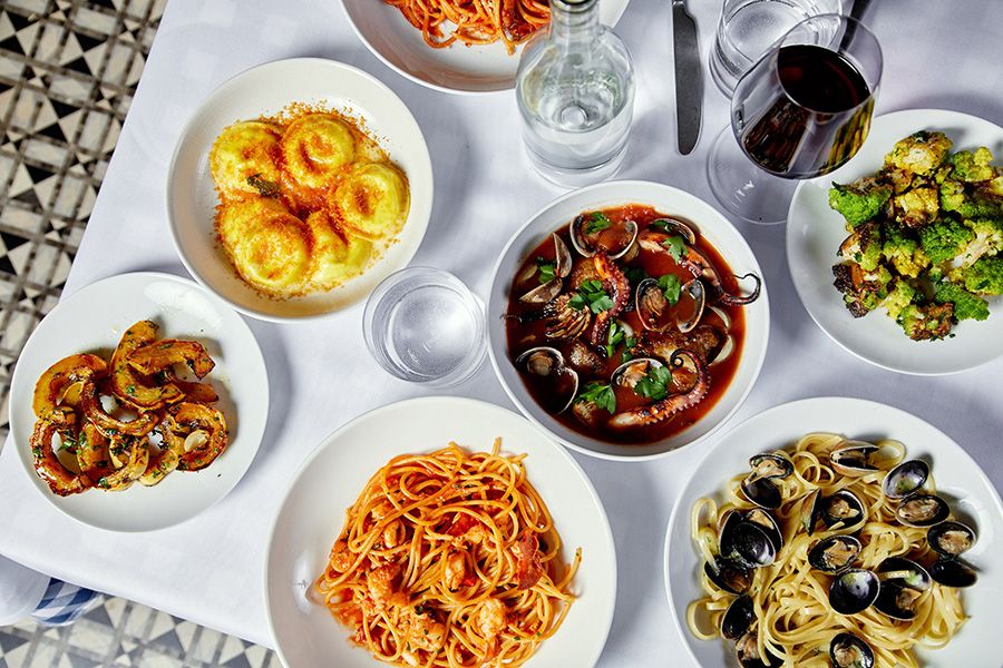 Color photograph of food on plates on a table