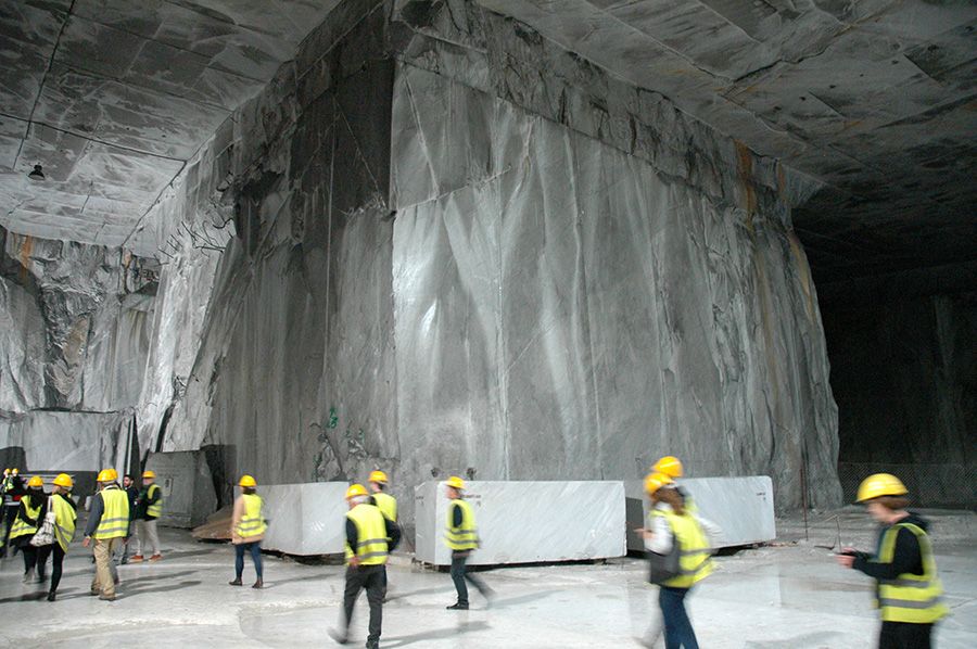People walking in a marble quarry