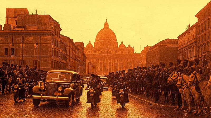 Detail of the cover of David Kertzer's book The Pope at War, showing a yellow and orange tinted photograph of a Roman avenue, with a car and men on motorcycles driving toward the photographer; to the right and left sides of the road are soldiers on horseback