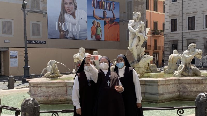 Color photographs of three nuns taking a selfie in front of a Roman fountain