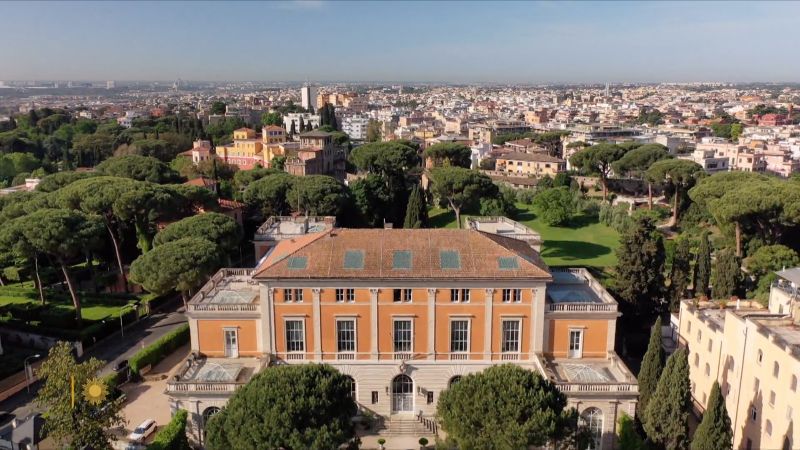 An aerial view of the American Academy in Rome's McKim, Mead & White Building, with the city of Rome behind it in the distance