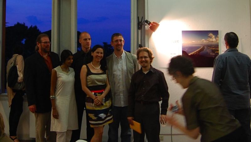 A group of people in a studio at dusk